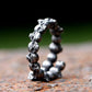 Gothic Wraparound Band of Skulls Ring Mens - Titanium Steel Silver - Unisex - That Rock Aesthetic